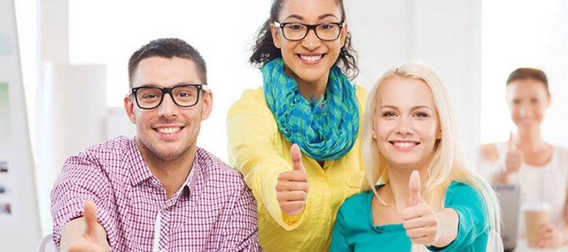 Four People Raising Their Thumbs